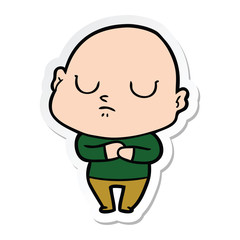 sticker of a cartoon bald man