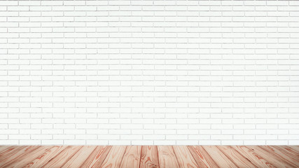 Empty top of wood floor with white brick wall background.