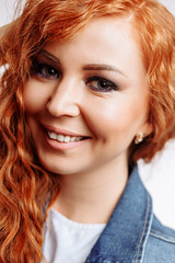 Close up portrait of young beautiful redhead girl