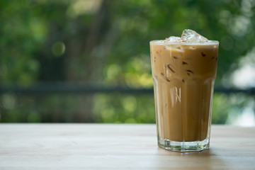 Iced espresso coffee in tall shape glass