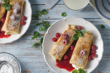 Cheese blintzes pancakes with fresh fruit