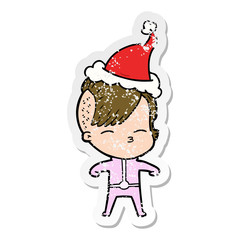 distressed sticker cartoon of a girl wearing futuristic clothes wearing santa hat