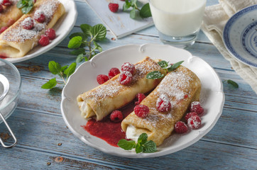 Cheese blintzes pancakes with fresh fruit