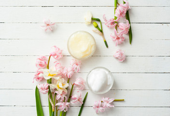 Moisturizers with hyacinth and daffodil flowers