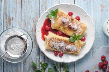 Cheese blintzes pancakes with fresh fruit