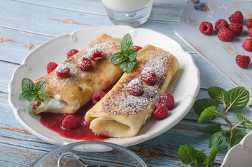 Cheese blintzes pancakes with fresh fruit