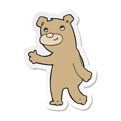 Obraz na płótnie Canvas sticker of a cartoon happy waving bear