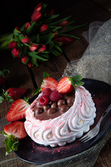 light pavlova with fresh fruits and chocolate
