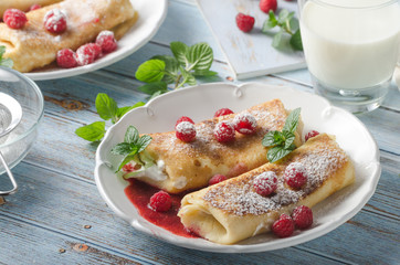 Cheese blintzes pancakes with fresh fruit