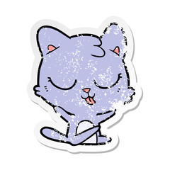 distressed sticker of a cartoon cat