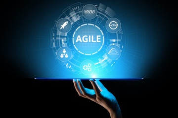 Agile development methodology concept on virtual screen. Technology concept.