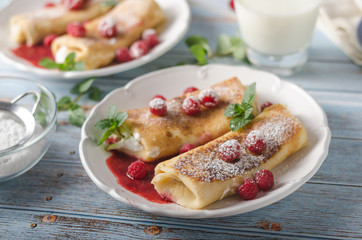Cheese blintzes pancakes with fresh fruit