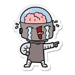 sticker of a cartoon crying robot pointing