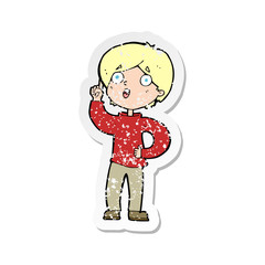 retro distressed sticker of a cartoon boy with idea