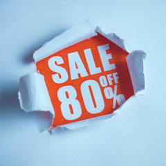 The concept of sales in the form of discounts 80. The inscription on the red paper coming out of...