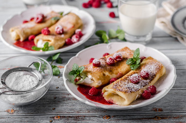 Cheese blintzes pancakes with fresh fruit