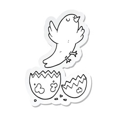 sticker of a cartoon bird hatching from egg