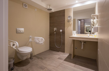 Fototapeta na wymiar Hotel bathroom interior with shower cabin