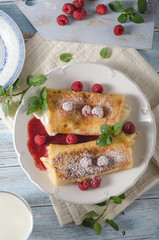 Cheese blintzes pancakes with fresh fruit