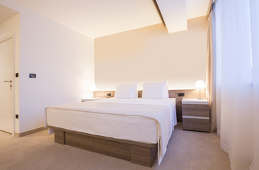 Interior of a modern new hotel bedroom