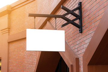 horizontal black empty signage on clothes shop front with copy space.