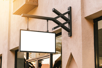 horizontal black empty signage on clothes shop front with copy space.