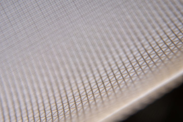 Metal wire mesh background or texture. Close-up, macro shot.