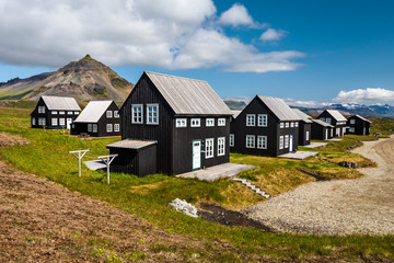 Wooden houses in Icelandic Hellnar village.