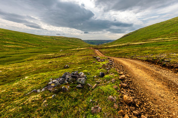 Laxardalsvegur road through the Wild landscape of Vesturland region of Iceland.