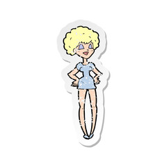 retro distressed sticker of a cartoon happy woman with hands on hips