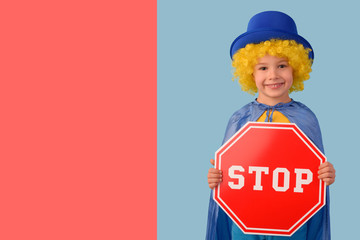 Little boy with a stop sign. Space for text