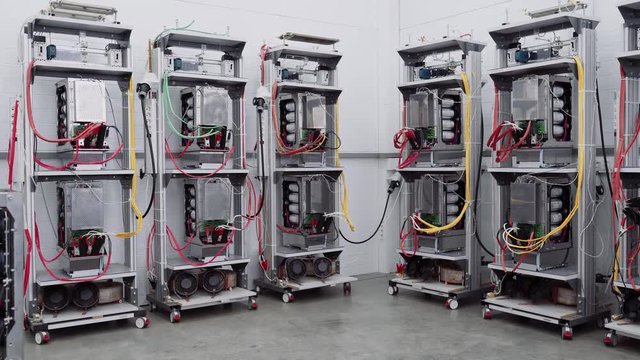 Test benches in the laboratory for the production of microprocessor-based protection and automation devices.