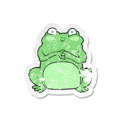 retro distressed sticker of a cartoon funny frog