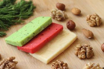 cheese green red nuts wooden milk breakfast lunch