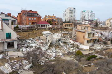 Landslide caused by rains of hurricane destroyed expensive cottages and houses. Destroyed house,...