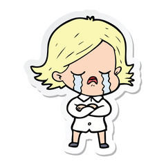 sticker of a cartoon girl crying