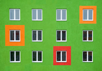 Bright facade, residential building with large Windows