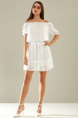 Slim young woman in white dress and summer time 