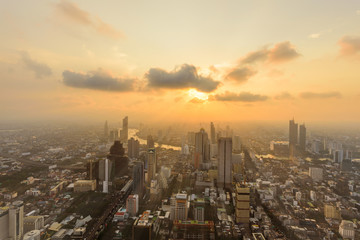 Fototapeta na wymiar high view of the city in sunset time / High view of Bangkok city in sunset