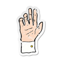 Obraz premium retro distressed sticker of a cartoon hand reaching