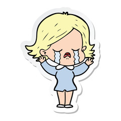 sticker of a cartoon girl crying