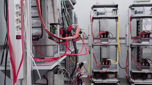 Test benches in the laboratory for the production of microprocessor-based protection and automation devices.