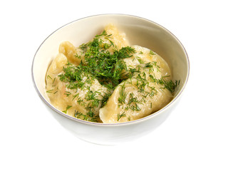 Dumplings, filled with cabbage in a plate, isolated on white background.
