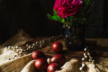 Easter eggs and flowers, willow branches