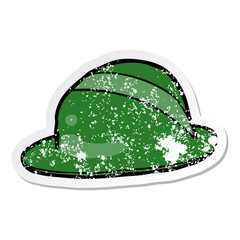 distressed sticker of a cartoon bowler hat