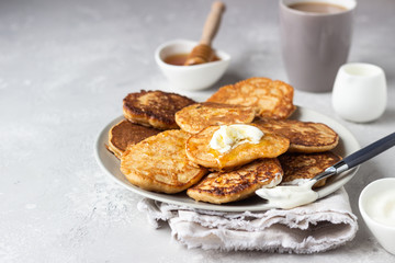 Buckwheat pancakes with honey and sour cream. Breakfast or brunch. Gluten free pancakes.