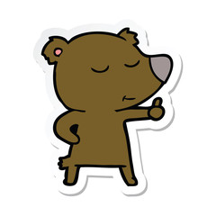 sticker of a happy cartoon bear giving thumbs up