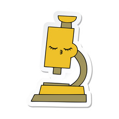 sticker of a cute cartoon microscope