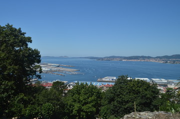 Fototapeta na wymiar Views Of The Commercial Port From The Castro Mountain In Vigo. Nature, Architecture, History, Travel. August 16, 2014. Vigo, Pontevedra, Galicia, Spain.