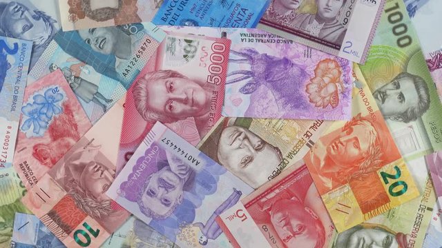 South America currency notes rotating. South American money, trade, economy, market. 4K stock video footage
